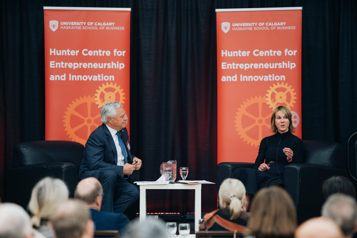 Wayne Henuset, left, speaks with U.S. Ambassador to Canada Kelly Craft on Nov. 22 at the University of Calgary. 