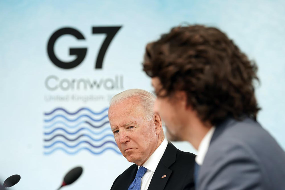 U.S. President Joe Biden listens as Prime Minister Justin Trudeau speaks