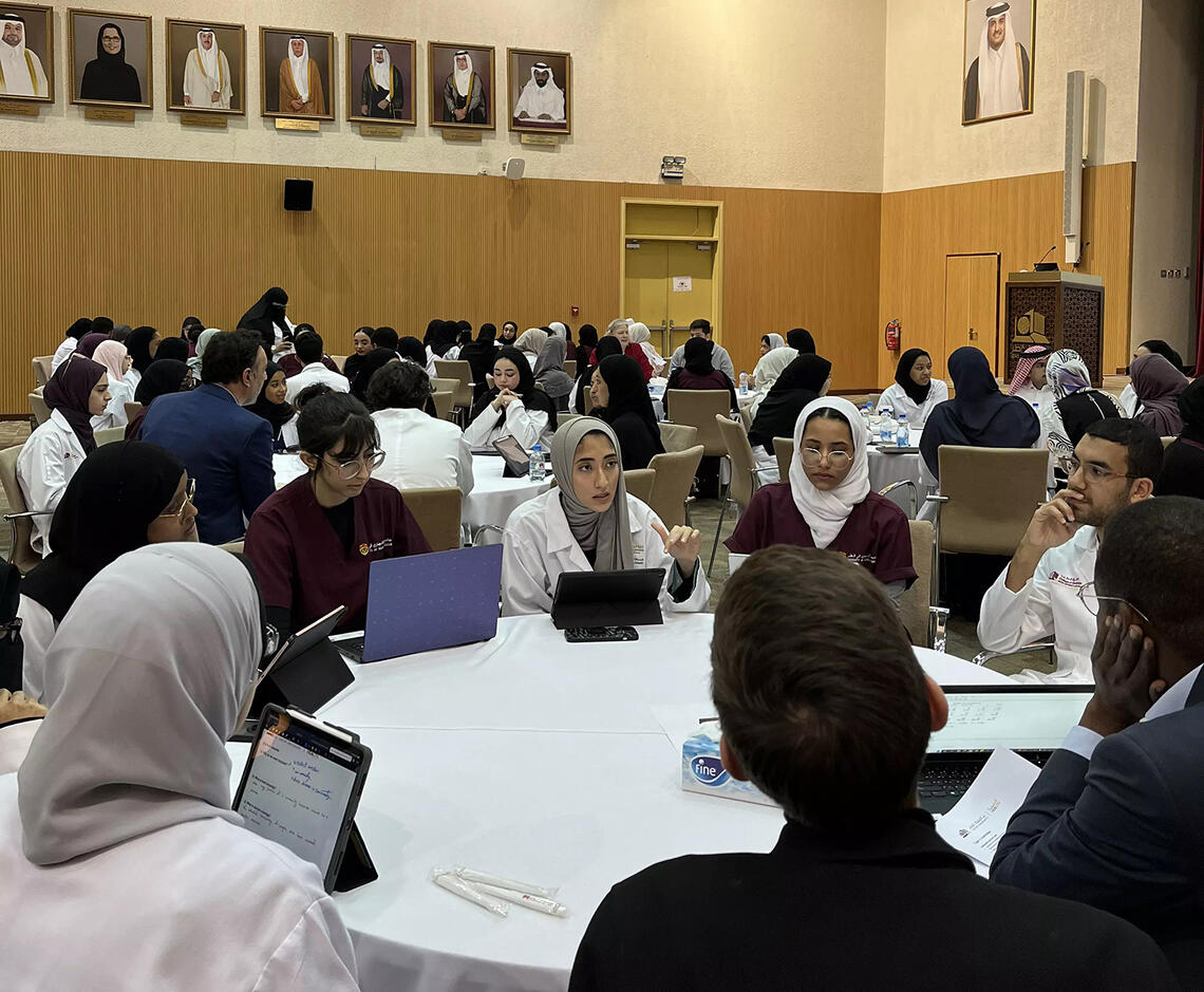 UCQ Students taking part in an interactive group discussion at the Interprofessional Education (IPE) event organised at Qatar University
