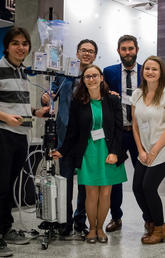 The winning team in the Innovation 4 Health competition received $30,000 for their automated, modular IV pole. Back row from left: Luis Souto Maior, David Tanhelson, Curt Zerr, Saba Aslam, Richard Beddoes, Lauren Wong. Front row: Miriam Nightingale, left, and Chelsea Ford-Sahibzada. Photos by Andres Kroker 