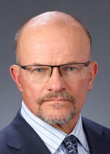 Mr. Marvin Romanow